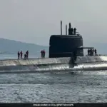 A Pakistani submarine docked at a naval base, symbolizing the challenges facing the nation's submarine program.