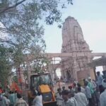 Rescue workers at the site of the Parbhani temple roof collapse in Maharashtra.