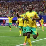 South Africa players celebrate after a match, keeping their FIFA World Cup knockout dream alive.