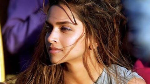 Deepika Padukone looking confident and smiling, discussing women making a pass being a bigger compliment.
