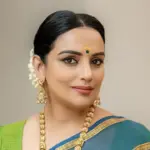 Shwetha Menon, AMMA's first female president, and the committee members during a press conference announcing their resignations.