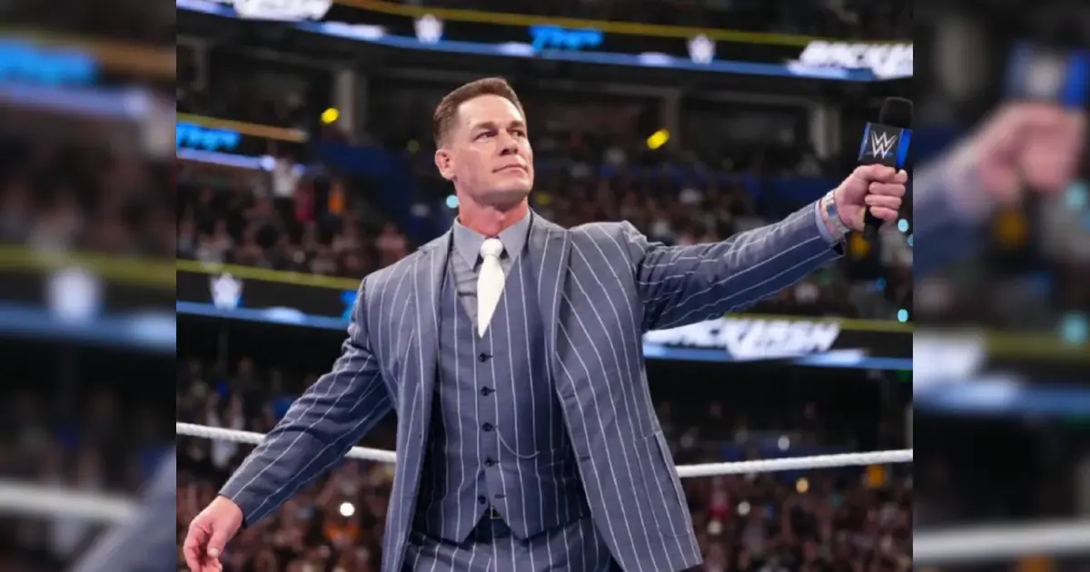 John Cena in a WWE ring, looking thoughtful