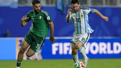 Graphic illustrating the race to 100 goals in the 2026 World Cup, highlighting the speed of scoring.