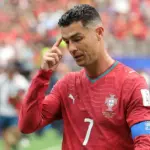Cristiano Ronaldo in a Portugal World Cup match, looking frustrated.