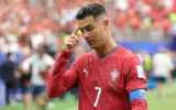 Cristiano Ronaldo in a Portugal World Cup match, looking frustrated.