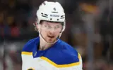 Bowen Byram in action on the ice, with NHL insider Darren Dreger's report fueling trade rumors.