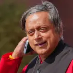 Shashi Tharoor, a prominent Congress leader, speaking at a press conference amidst a political storm over his remarks on Kashmir.
