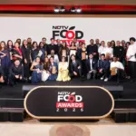 Aminia restaurant staff celebrating their win at the NDTV Food Awards 2026 for Restaurant of India.