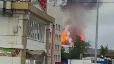 Ukrainian drone strike hits Moscow refinery, causing a tank lid to blow off.