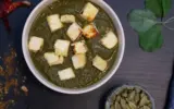 Close-up of soft, crumbly paneer cubes in a bowl, ready for cooking.