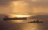 US lifts Iran ports blockade, signaling a shift in diplomatic relations and opening avenues for dialogue.