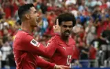 Cristiano Ronaldo celebrates scoring a goal for Portugal against Uzbekistan in Houston.