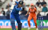 Smriti Mandhana celebrating a milestone during the India vs Netherlands Women's T20 World Cup 2026 match.