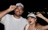 Taylor Swift and Travis Kelce in a candid moment, fueling wedding rumors.