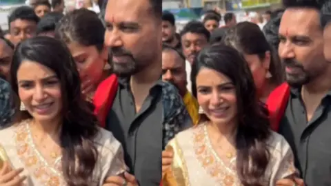 Raj Nidimoru escorts Samantha Ruth Prabhu away from fans at Tirumala.