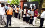 NEET re-exam 2026 security measures in place with students taking the test under camera surveillance.