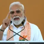 Prime Minister Narendra Modi participates in a yoga session on International Yoga Day.