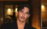 Ishaan Khatter smiling, looking thoughtful.