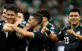 Mexico players celebrating after qualifying for the 2026 World Cup knockouts.