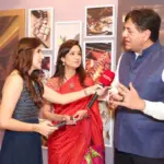 Vikram and Seema Chandra at the NDTV Food Awards ceremony, celebrating their culinary journey.