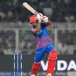 KL Rahul batting during a cricket match, with Rishabh Pant potentially returning to Delhi Capitals.