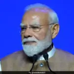 Prime Minister Narendra Modi addressing a gathering in France, highlighting India's role as a trusted partner.
