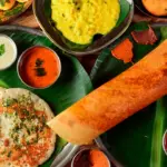 A vibrant street food stall in Bengaluru, India, showcasing a variety of delicious local dishes.