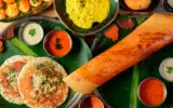 A vibrant street food stall in Bengaluru, India, showcasing a variety of delicious local dishes.