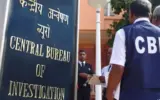 CBI officials apprehending a suspect in connection with the 2021 Bengal post-poll violence murder case.