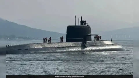 A Pakistani submarine docked at a naval base, symbolizing the challenges facing the nation's submarine program.