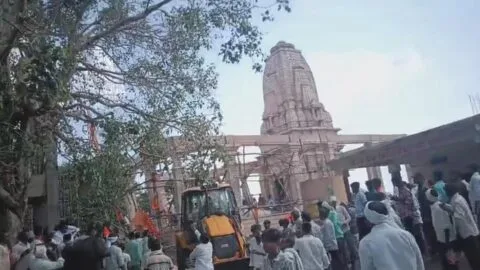 Rescue workers at the site of the Parbhani temple roof collapse in Maharashtra.