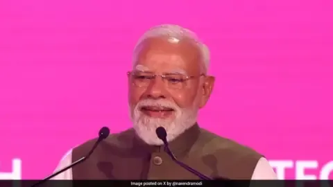 PM Modi speaking at VivaTech 2026 in Paris, emphasizing AI for all-inclusive development in India.