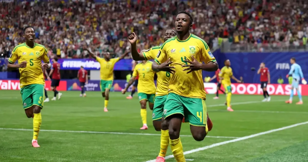 South Africa players celebrate after a match, keeping their FIFA World Cup knockout dream alive.