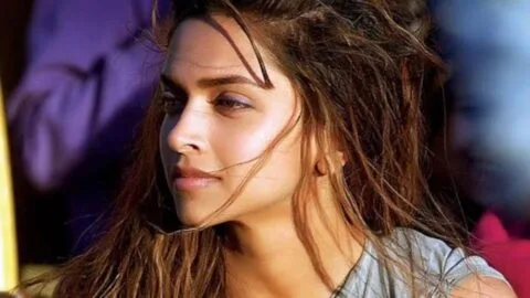 Deepika Padukone looking confident and smiling, discussing women making a pass being a bigger compliment.