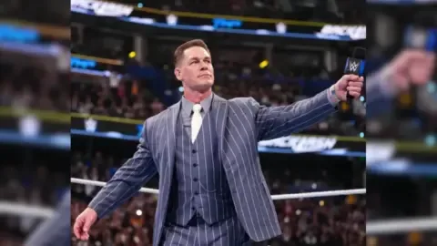 John Cena in a WWE ring, looking thoughtful