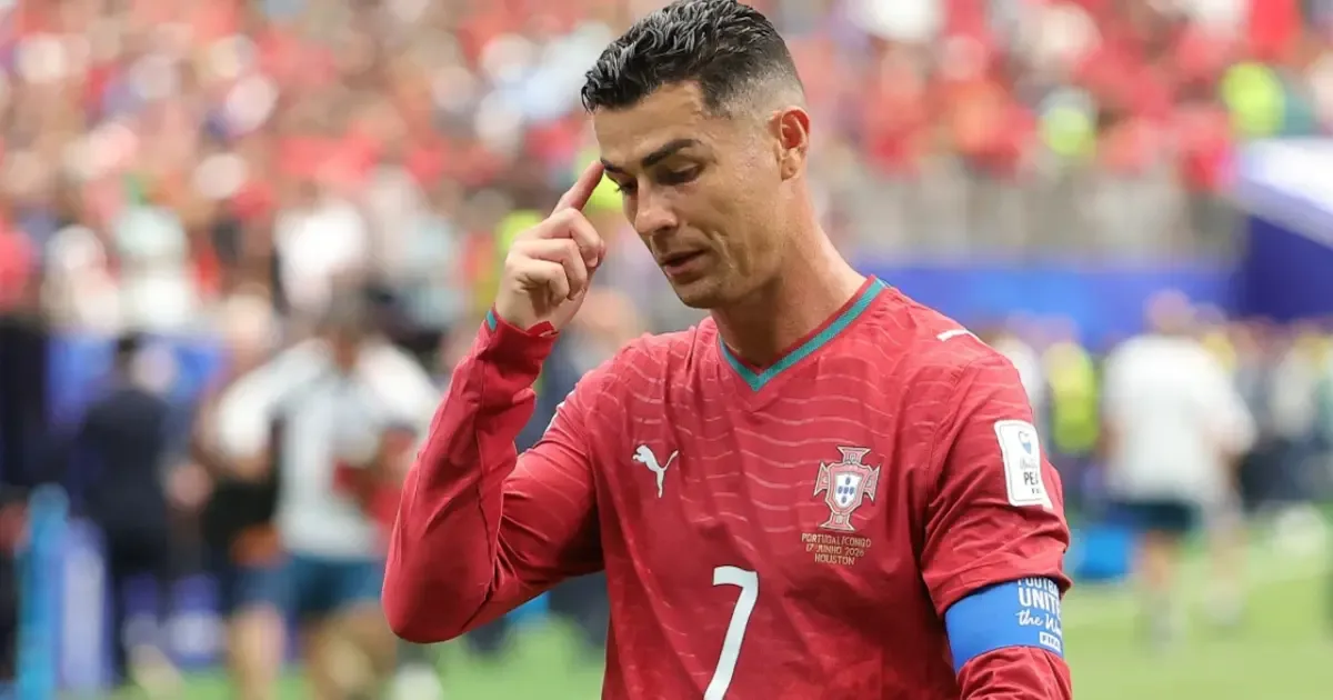 Cristiano Ronaldo in a Portugal World Cup match, looking frustrated.
