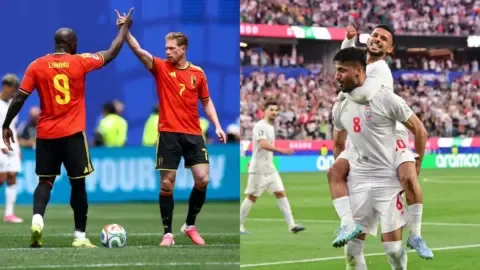 Romelu Lukaku of Belgium receives a yellow card during the Belgium vs Iran World Cup 2026 qualifier match.