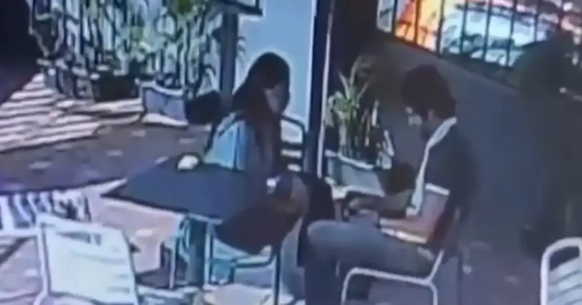 Siya Goyal, a suspect in the Ketan Agarwal cafe murder case, is seen during a cafe meeting.