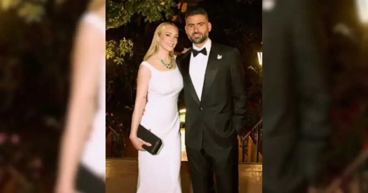Lindsay Lohan and Bader Shammas celebrating together.