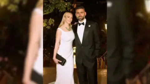 Lindsay Lohan and Bader Shammas celebrating together.