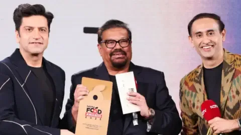 Chef Kunal Kapur celebrating his win at the NDTV Food Awards 2026.