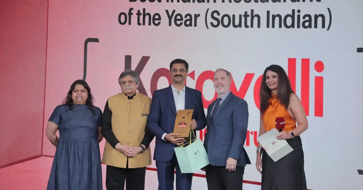 Karavalli restaurant team celebrating their win at the NDTV Food Awards 2026 for Best South Indian Restaurant.