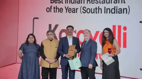 Karavalli restaurant team celebrating their win at the NDTV Food Awards 2026 for Best South Indian Restaurant.