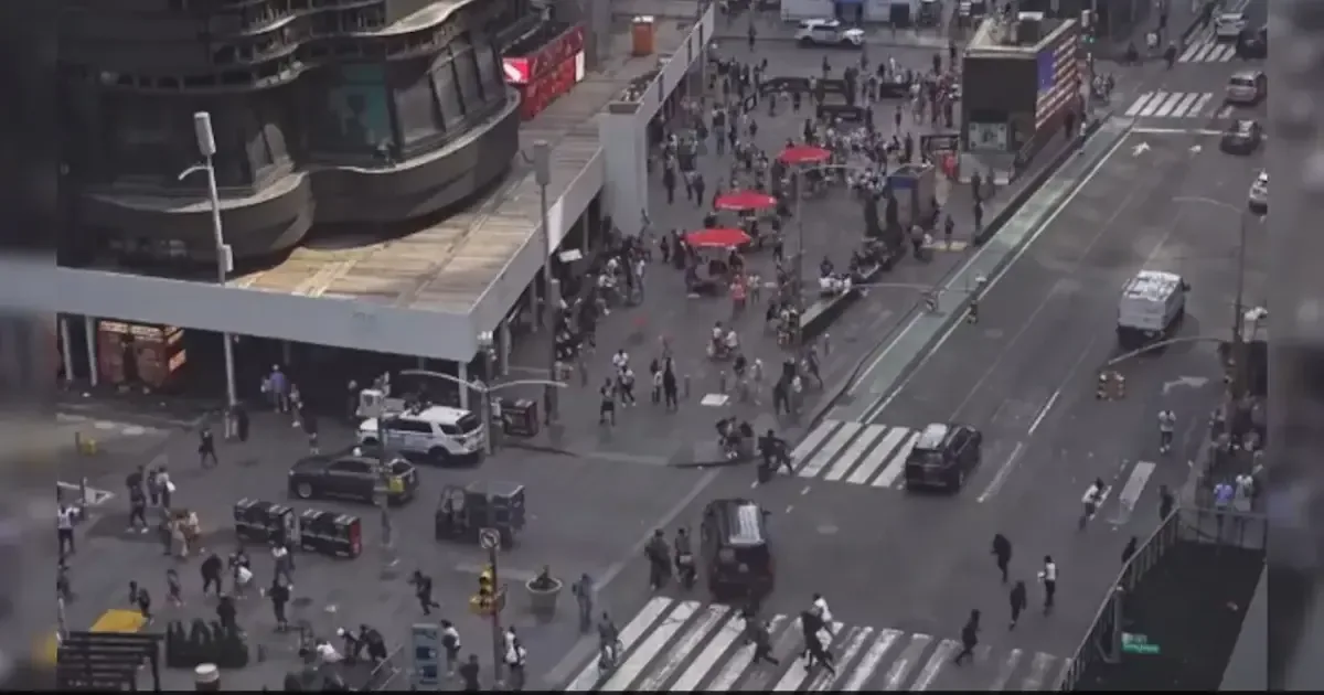 People running in panic after shots fired in Times Square, New York.