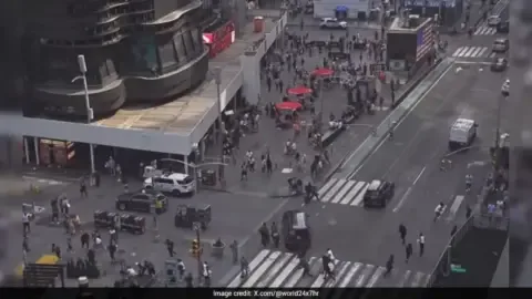 People running in panic after shots fired in Times Square, New York.