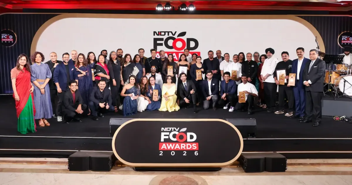 Aminia restaurant staff celebrating their win at the NDTV Food Awards 2026 for Restaurant of India.