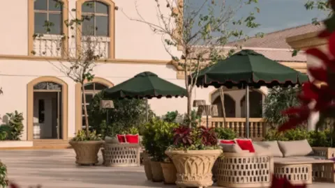 Rosso Pune restaurant interior with elegant seating and wine displays