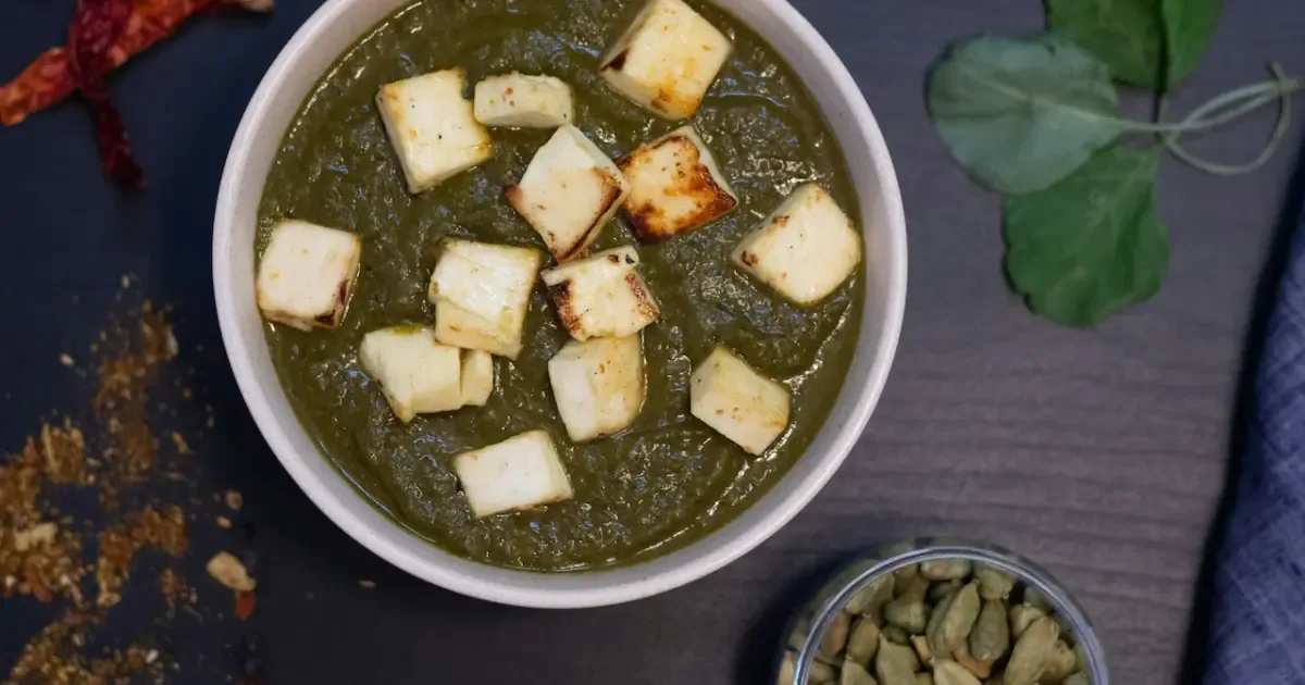 Close-up of soft, crumbly paneer cubes in a bowl, ready for cooking.