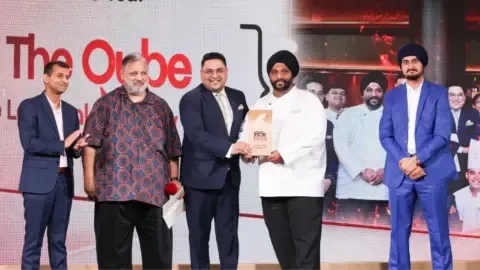 The Qube restaurant at The Leela Palace New Delhi, recognized as the Best All-Day Dining Restaurant.