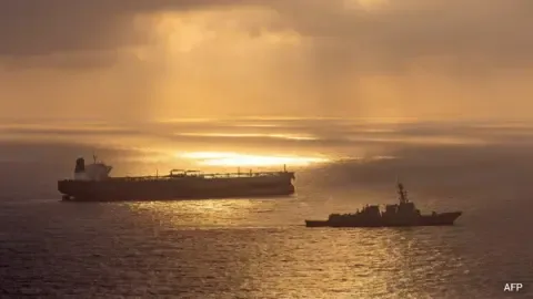 US lifts Iran ports blockade, signaling a shift in diplomatic relations and opening avenues for dialogue.